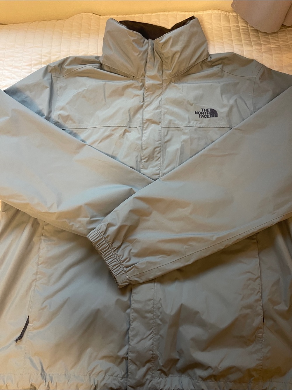 The North Face Men's Pale Gray Raincoat with High Collar